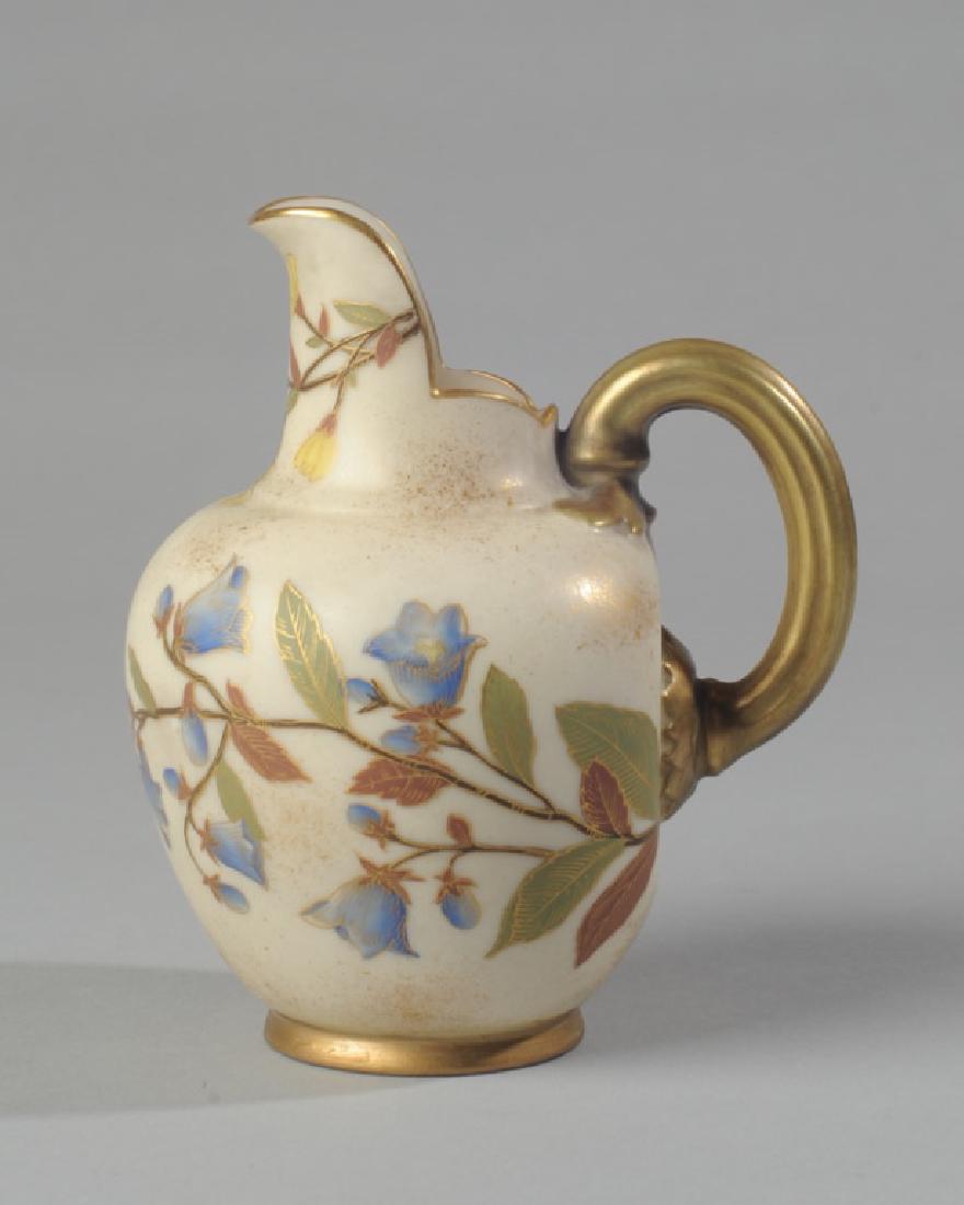 Royal Worcester Pitcher: Floral motif, marked to base. H: approx. 5". A0474