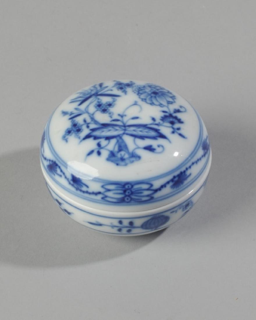 Meissen Lidded Box: Blue and white, crossed swords mark to base. H: approx. 2". Dia: approx. 2 3/4". A1502