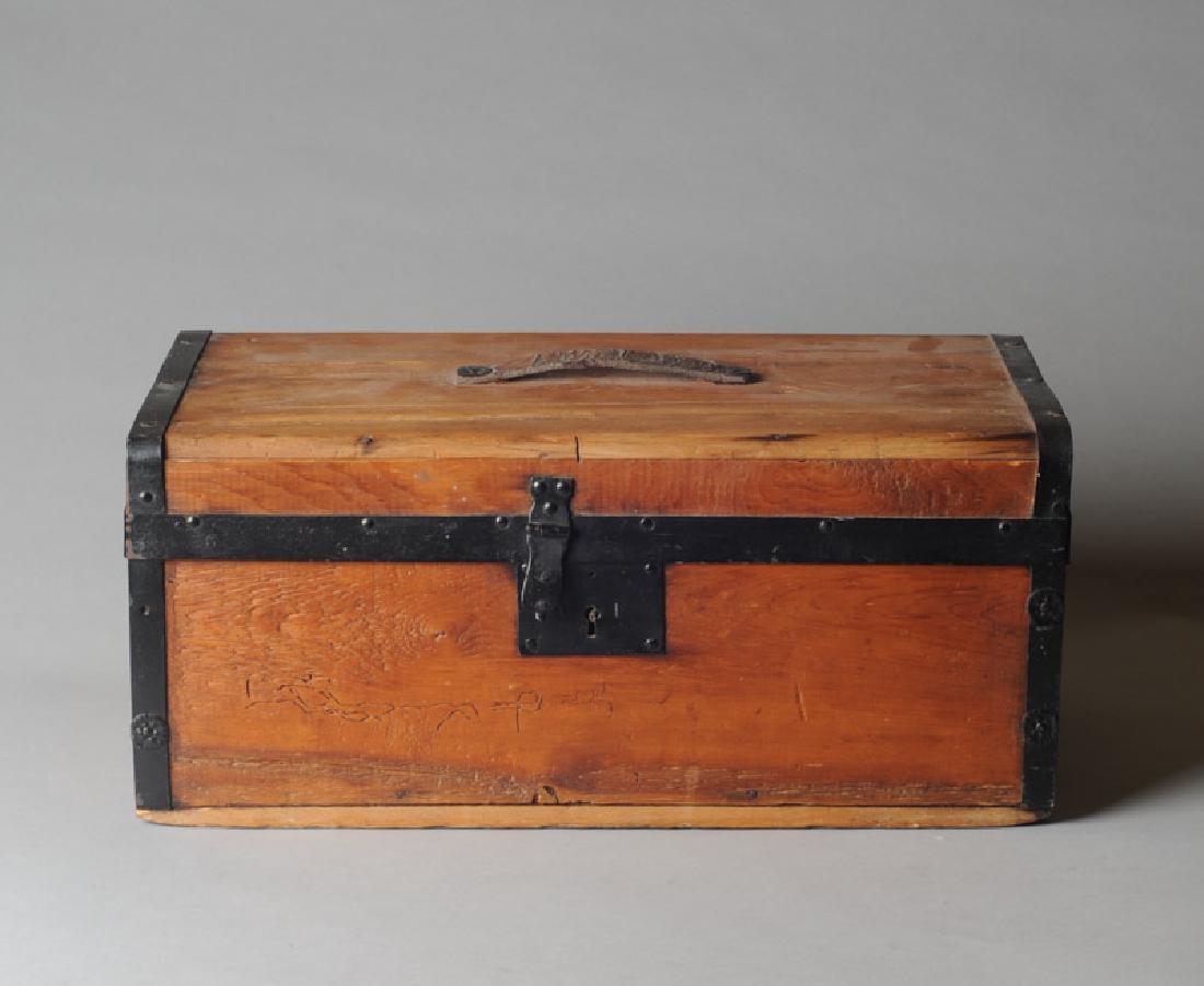 Small Wooden Trunk: Leather handle and metal elements. H: approx. 9". W: approx. 20". D: approx. 10 1/2".