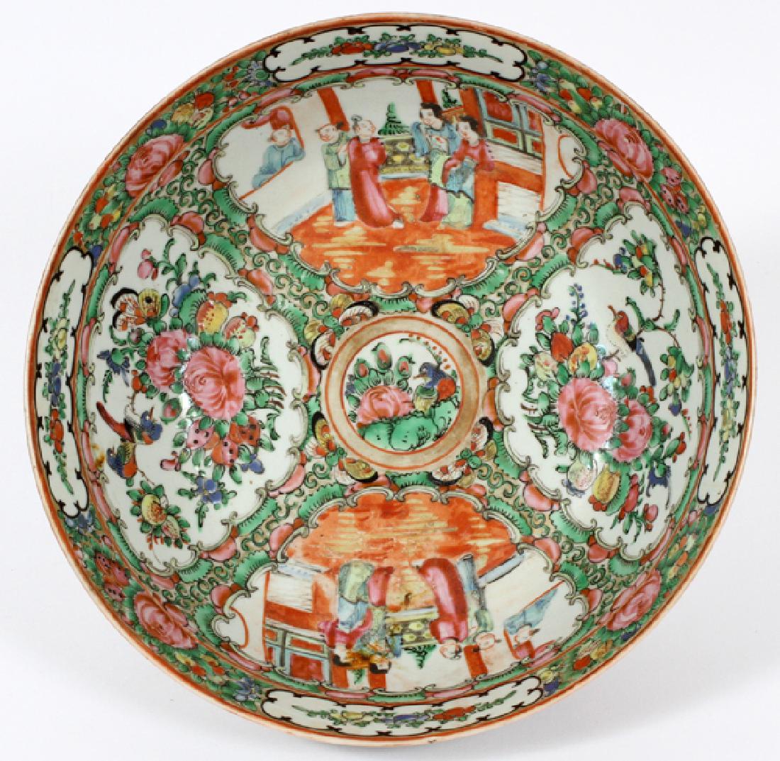 FAMILLE ROSE CHINESE CENTERPIECE BOWL CIRCA 1850: FAMILLE ROSE CHINESE CENTERPIECE BOWL CIRCA 1850 H 3.5" DIA 9":Alternating panels with figures in interior scenes and floral/bird. From the Estate of Daniel Clancy, Voltaire Place, Grosse Pointe Farms
