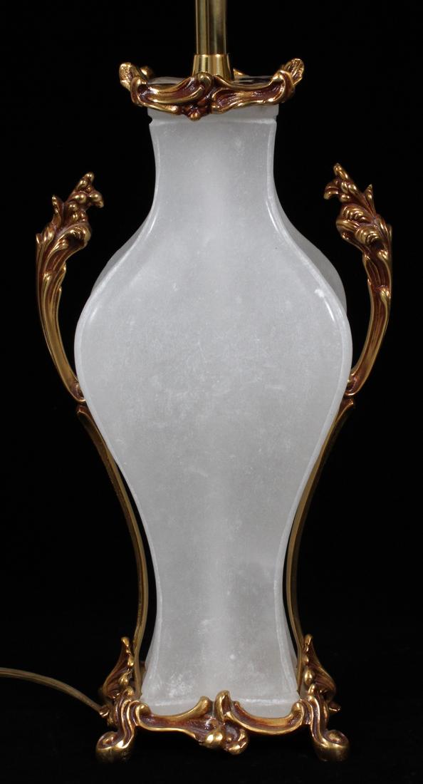 ALABASTER AND BRASS TABLE LAMP: ALABASTER AND BRASS TABLE LAMP, H 29", W 8 1/4":Leaf form brass mounted to an alabaster base.