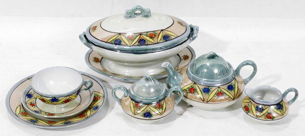 JAPANESE PORCELAIN CHILD'S PLAY TEA SET: JAPANESE PORCELAIN CHILD'S PLAY TEA SET, C. 1940, 23 PIECES:Including 1 diminutive teapot, H.3 1/2", 1 creamer, 1 covered sugar bowl, 1 oval covered tureen, L.7 1/2", 1 oval platter, L.7 1/4", 6 plate