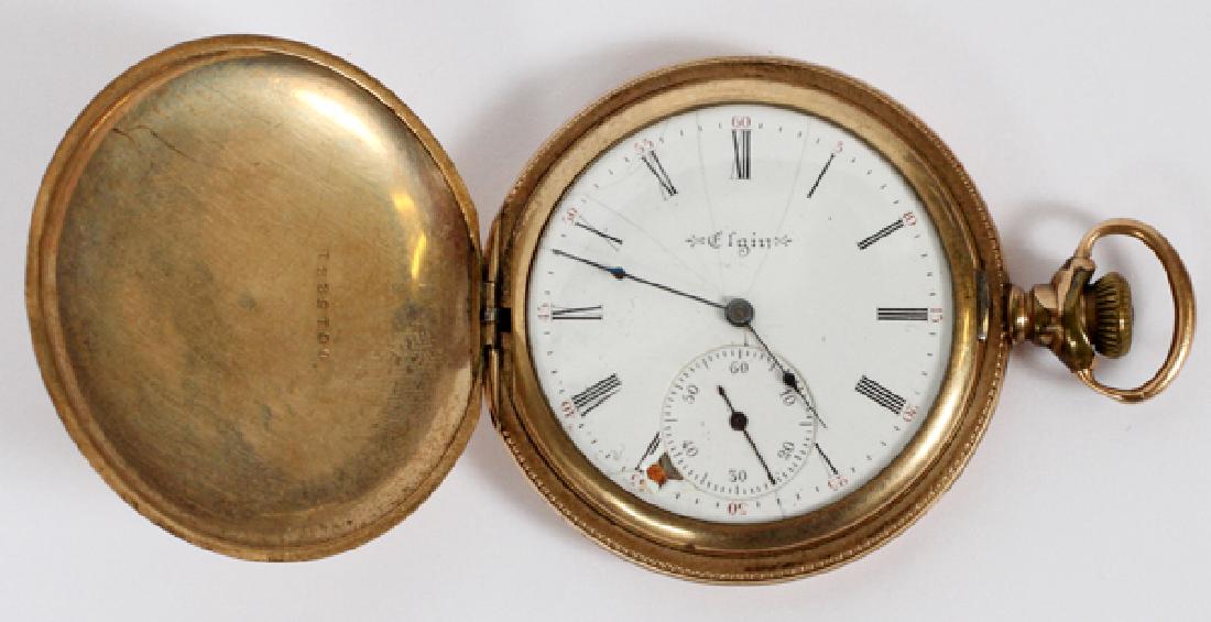 ELGIN WATCH CO. 10KT GOLD PLATED POCKET WATCH: ELGIN WATCH CO., 10KT GOLD PLATED, POCKET WATCH, #9898927:Elgin 10 kt yellow gold plated pocket watch with Roman numerals, seconds dial at 6:00, 15 jewels. Inscribed: "Elgin" below 12:00. 1 1/2" face.