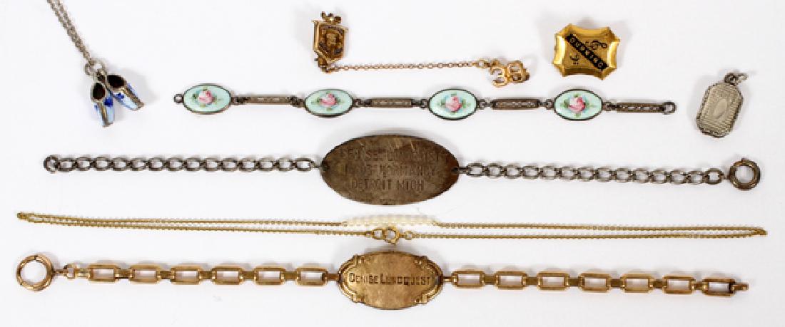 GOLD AND SILVER JEWLERY: GOLD AND SILVER JEWLERY:14 kt gold child's necklace Dutch shoe necklace,school pins,three bracelets 8 pieces