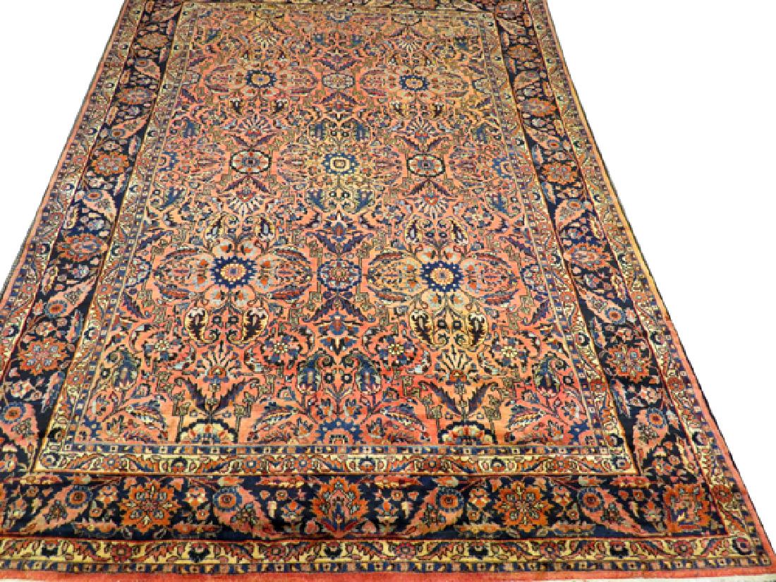 PERSIAN ANTIQUE MAHAL CARPET 1930S: PERSIAN ANTIQUE MAHAL CARPET, 1930S, 10' X 14' 5":An overall floral motif, accented in blues, yellow, orange, salmon, and green.