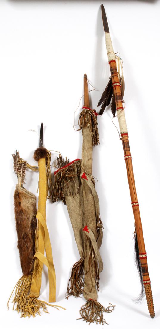 GROUP OF NATIVE AMERICAN WEAPONS: GROUP OF NATIVE AMERICAN WEAPONS, MODERN 20TH C, H 74":Comprising two bows, two quivers with arrows, and one spear. All having hide additions and feathers. Spear measuring 74 1/4" in height. Modern 20