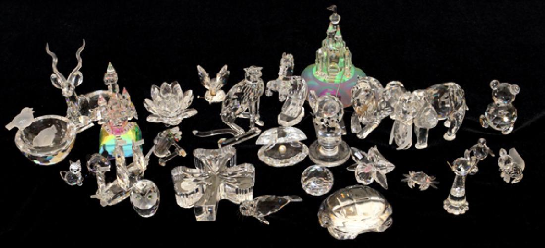 SWAROVSKI CRYSTAL FIGURES 32 PIECES: SWAROVSKI CRYSTAL FIGURES, 32 PIECES:A group of 32 crystal figures of animals. From The George and Penny Simon Collection, Grosse Pointe Farms, Michigan.