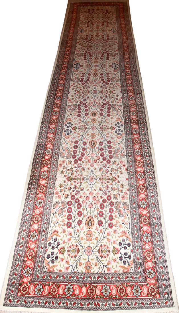 ORIENTAL RUNNER: ORIENTAL RUNNER, W 40" L 16' 2":Having an overall floral motif with a beige ground and red border. From The George and Penny Simon Collection, Grosse Pointe Farms, Michigan.