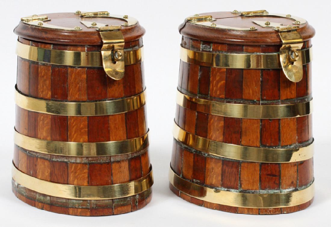 A PAIR OF ENGLISH BRASS-BOUND OAK STAVE BARRELS (1 of 4)