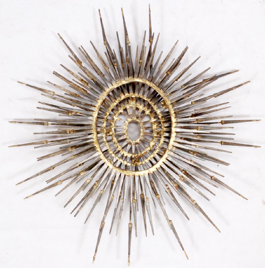 SUNBURST METAL SCULPTURE: SUNBURST METAL SCULPTURE, DIA 24":The sunburst wall sculpture has three tiers. Unsigned.