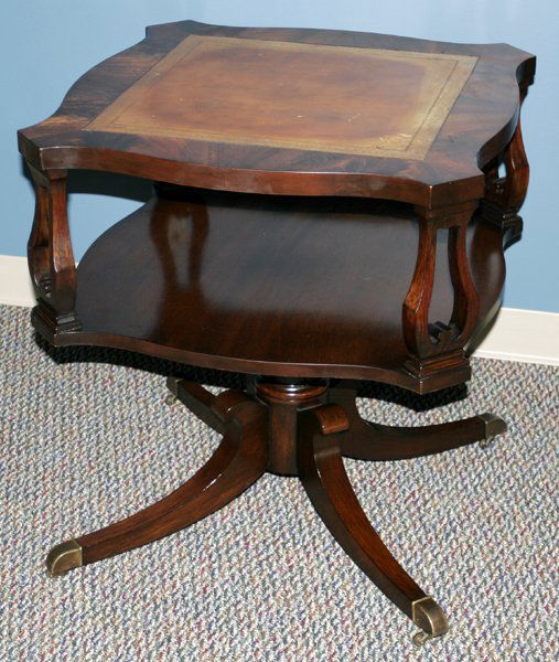 FEDERAL MAHOGANY SQUARE LEATHER TOP TABLE: FEDERAL MAHOGANY SQUARE LEATHER TOP TABLE, C. 1940, H 26", W 24":Four feet with brass mounts raised on casters.