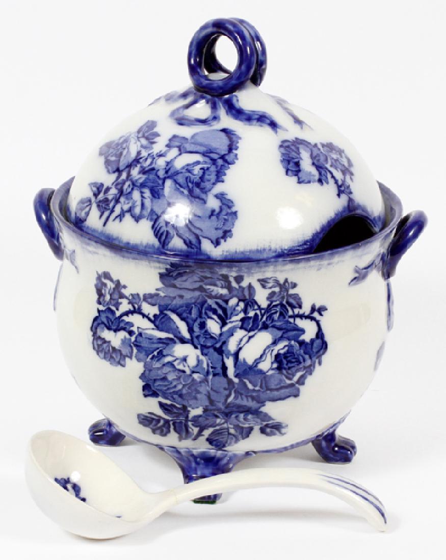 'IRONSTONE STAFFORDSHIRE ENGLAND' TUREEN W/ LADLE: 'IRONSTONE STAFFORDSHIRE, ENGLAND' BLUE & WHITE TUREEN WITH LADLE, H 14", W 11 1/2":Having a round domed lid with ring finial/handle. Body of tureen has flared rim, bulbous body, two ring handles, paw
