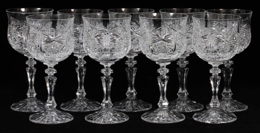 CUT CRYSTAL GOBLETS 9: CUT CRYSTAL GOBLETS, 9, H 6 1/8":Goblets or wines. Set of nine. All in good condition. Circa 1940. jw From a prominent Bloomfield Hills collector.