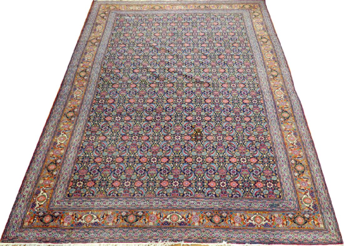 PERSIAN ANTIQUE MAHAL CARPET: PERSIAN ANTIQUE MAHAL CARPET, 10' X 12' 8":A navy ground with overall foliate motif, shades of orange, blue, red, green, ivory, and purple.