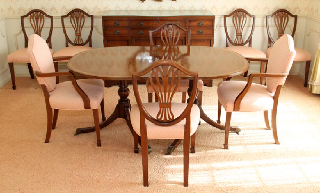 KITTINGER MAHOGANY BUFFET ALSO TABLE 8 CHAIRS: KITTINGER MAHOGANY BUFFET, ALSO TABLE, 8 CHAIRS, 10 PIECES CIRCA 1940:Includes buffet with Kittinger trademark L 52" H35" D20", oval table on brass casters with no trade mark (probably Kittinger] W 42