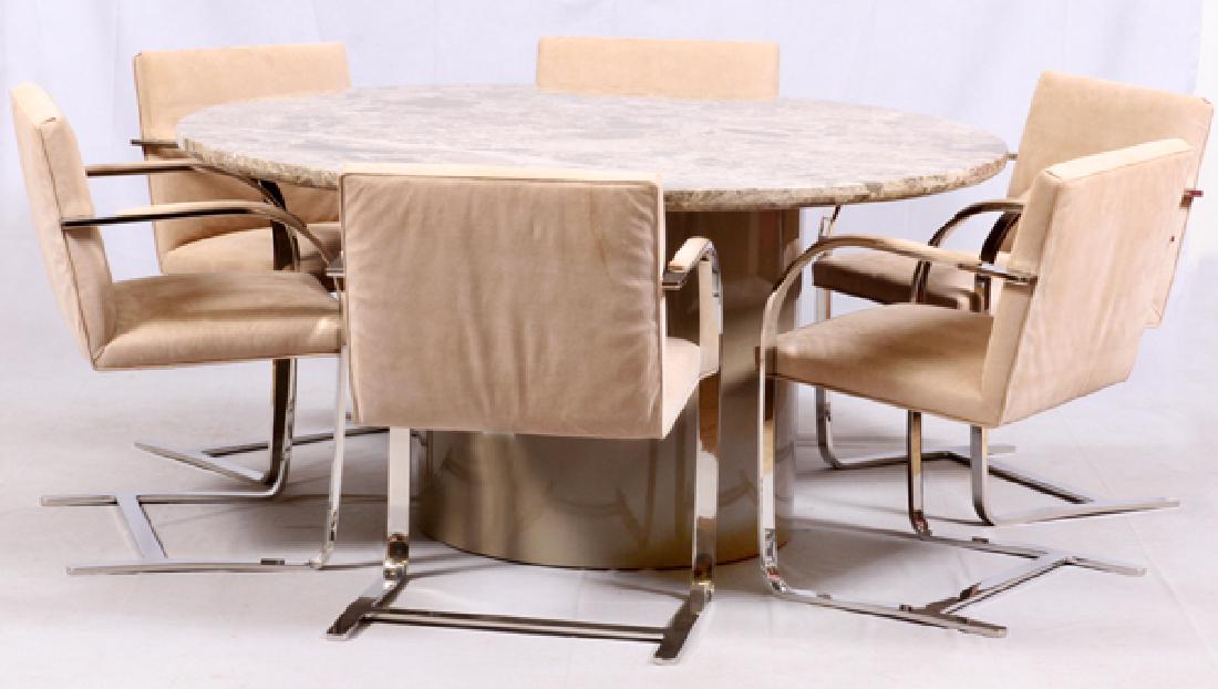 CIRCULAR GRANITE TABLE & BRUETON TUBULAR CHAIRS: CIRCULAR GRANITE TABLE AND BRUETON TUBULAR CHAIRS, SEVEN PIECES:A granite top table, H 29.5", Dia 60" on a cylindrical base. Accompanied by six Brueton chairs with chrome arms and bases with polyureth