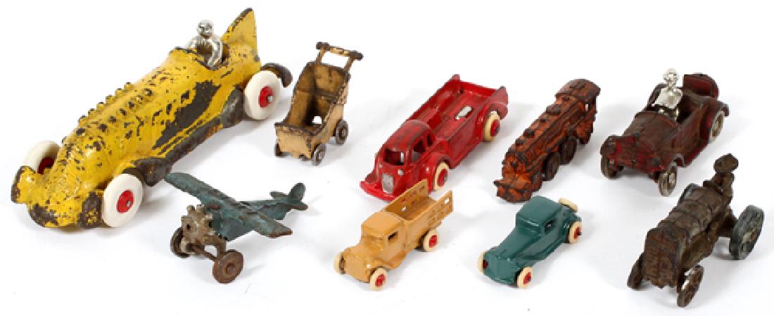 CAST METAL TOY PLANE LOCOMOTIVE CARS ETC C1920-40: CAST METAL TOY PLANE, LOCOMOTIVE, CARS, ETC, C1920-40 9 PCS., H 1 1/4" - 2 3/4", L 3 1/4" - 8 1/2":Cast metal toy 'Lindy' plane, locomotive, fire truck, Kilgore roadster with driver and rumble seat, y
