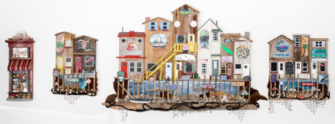 WILLIAM WALDEN FLORIDIAN WOOD VILLAGE GROUPS FOUR: WILLIAM WALDEN, FLORIDIAN WOOD VILLAGE GROUPS, FOUR, H 24"-33", W 7 1/2"-49":Includes four wood decorated village groups, based upon songs by Jimmy Buffett. Signed 'William Walden 99'.