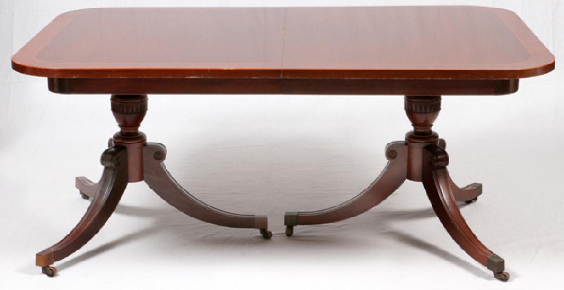 BERKEY AND GAY MAHOGANY DINING TABLE + 3 BOARDS: BERKEY AND GAY MAHOGANY DINING TABLE, W 42" L 64" + 3 BOARDS:Circa 1940. A two pedestal table, each with tripod curved fluted legs, on brass casters. Top has rounded corners and two fruit wood inlays