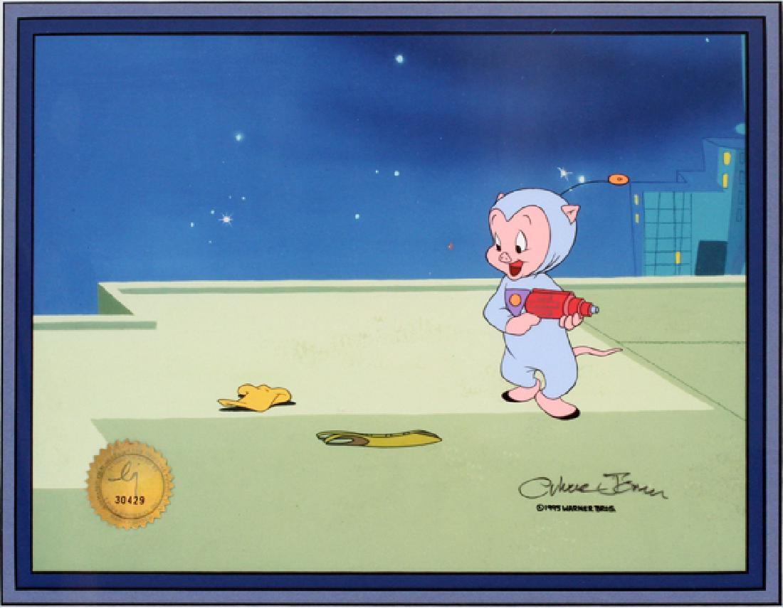 SIGNED WARNER BROS. CELLULOID: SIGNED WARNER BROS. CELLULOID, H 9'', W 12'', PORKY PIG FROM "SUPERIOR DUCK":Porky Pig from "Superior Duck", 1995. Original production celluloid signed by Chuck Jones with facsimile background. Visibl