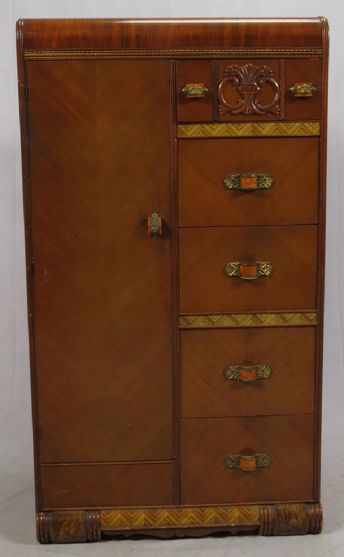 ART DECO STYLE WALNUT WARDROBE: ART DECO STYLE WALNUT WARDROBE, H 65", W 36", D 21":Featuring five drawers on right side and a full height wardrobe on the other half. Walnut veneer with Bakelite inserts on gilt metal pull handles.
