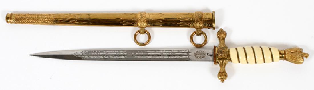 WW2 ORIGINAL GERMAN KRIEGSMARINE DRESS DAGGER: WW2, ORIGINAL GERMAN KRIEGSMARINE DRESS DAGGER, L 10" (BLADE), 16" O/A:Blade etched with H R Holler, Solingen, maker's mark. Brass braided wire wrapped celluloid grip with brass eagle clutching swasti