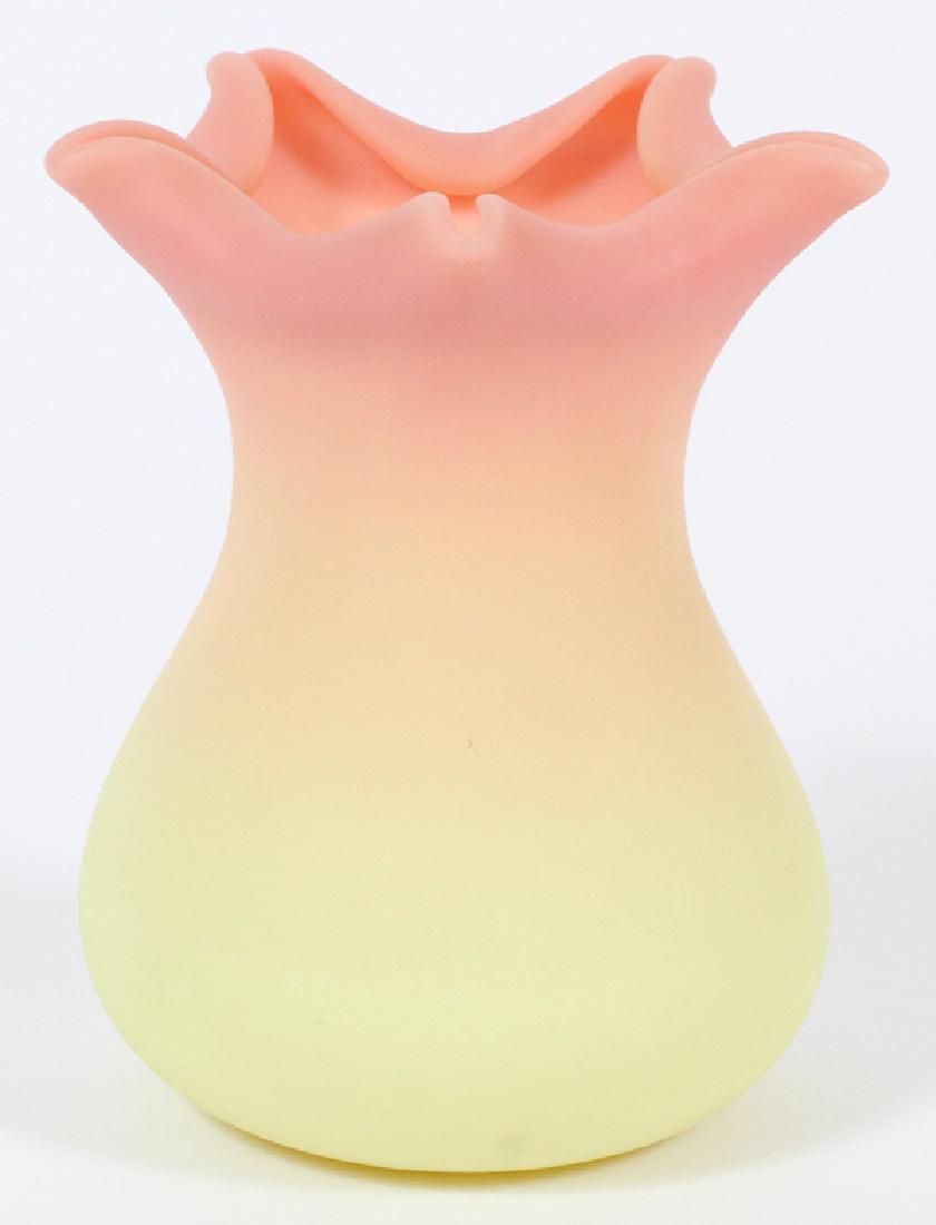 THOMAS WEBB & SONS BURMESE VASE C.1886-1895: THOMAS WEBB & SONS BURMESE VASE, C.1886-1895, H 3 3/8":Colored from pastel yellow to rose-pink at the folded rim. Marked at the underside: Thos Webb & Sons, Queen's Burmese ware, Patented, Ro. 67648.