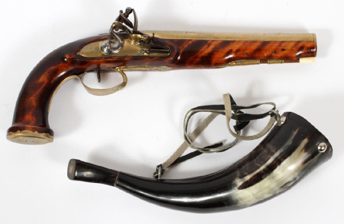 FLINT-LOCK PISTOL AND POWDER HORN 2 PIECES: FLINT-LOCK PISTOL AND POWDER HORN, 2 PIECES:European flintlock pistol, .50 cal. having a walnut stock with accent marks to wood. Having hexagonal brass barrel, 6" L., trigger guard, butt plate and sid