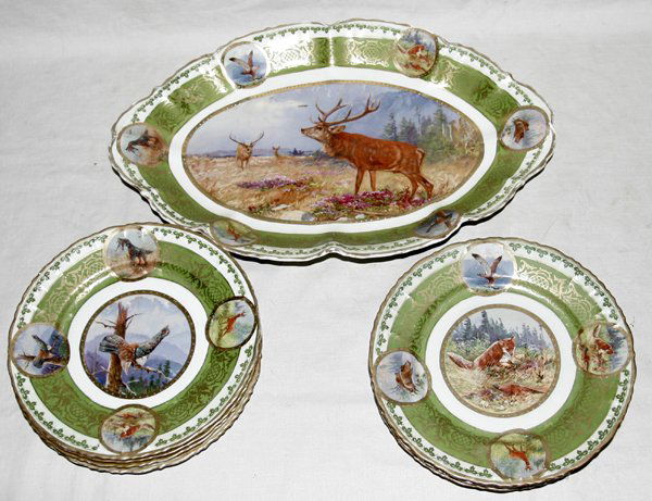 M.ZDEKAUER AUSTRIAN GAME SERVICE FOR EIGHT: MORITZ ZDEKAUER, AUSTRIAN PORCELAIN GAME SERVICE FOR EIGHT, EARLY 20TH C., NINE PIECES:Including 8 plates, Dia.8 1/2", and 1 oval platter, L.17", W.11"; each piece having fired gold accents, green bor