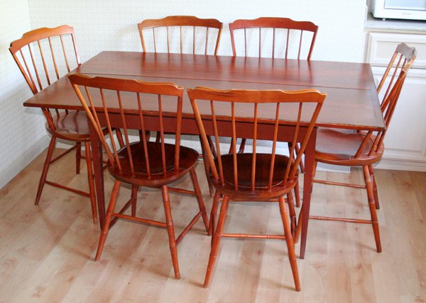 DAVID SMITH AMERICAN STYLE CHAIRS/TABLE: DAVID T. SMITH & CO., EARLY AMERICAN STYLE CHERRY SPINDLE BACK CHAIRS, EIGHT & A TABLE, W 36", L 60":Each chair having five spindles at the back, on turned supports and marked under the seat "David T.