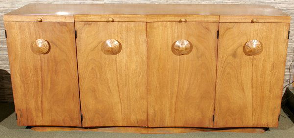 HERMAN MILLER 'PALDAO' EXOTIC WOOD SERVER: GILBERT ROHDE FOR HERMAN MILLER 'PALDAO' EXOTIC WOOD SERVER, H 34", W 72", D 19":En suite with preceding dining set, having two pull-out cutting boards, two side cupboards with shelves, drawers, and c