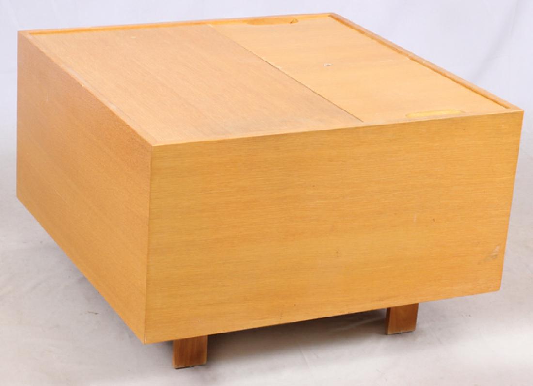 GEORGE NELSON FOR HERMAN MILLER RECORD CABINET: GEORGE NELSON FOR HERMAN MILLER, RECORD CABINET, C1960, H 22", W 34", L 34":George Nelson for Herman Miller, record cabinet with three flush mounted hinged lids which form the top opening to storage c
