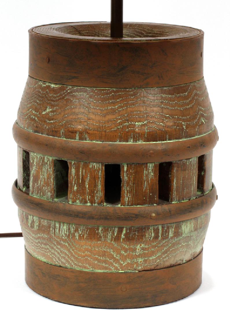 VINTAGE WESTERN WAGON WHEEL HUB LAMP: VINTAGE WESTERN WAGON WHEEL HUB LAMP, H 28":Wooden base lamp made from the hub of spoked wagon wheel. Includes shade. Overall height 28". Height of base only 11".