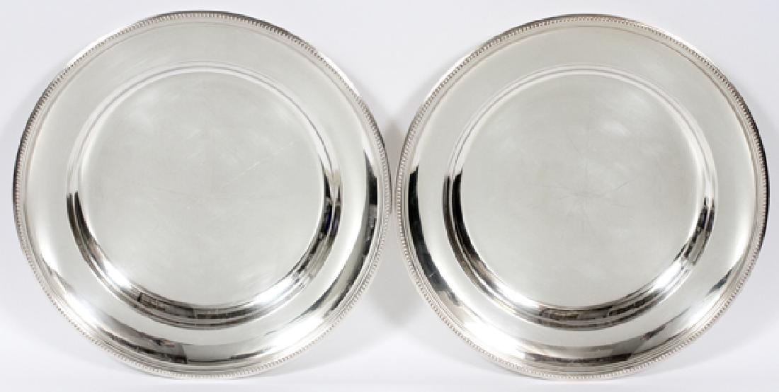 CHRISTOFLE FRANCE SILVER PLATE TRAYS PAIR: CHRISTOFLE, FRANCE SILVER PLATE TRAYS, PAIR, DIA 15":A matching pair with beaded rim, marked at the bottom with "Christofle, France".