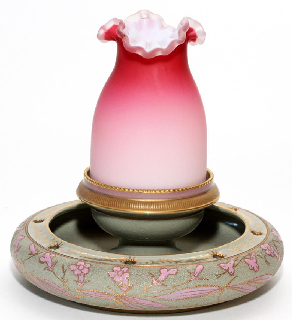 VICTORIAN FAIRY LAMP W/ CLARKE'S TAPESTRY WARE BASE: VICTORIAN GLASS FAIRY LAMP WITH CLARKE'S TAPESTRY WARE BASE, LATE 19TH/EARLY 20TH C., H 5", DIA 6 1/4":Having an attributed Thomas Webb & Sons ruffled top Peach Glass ("peach blow") Fairy Lamp dome re