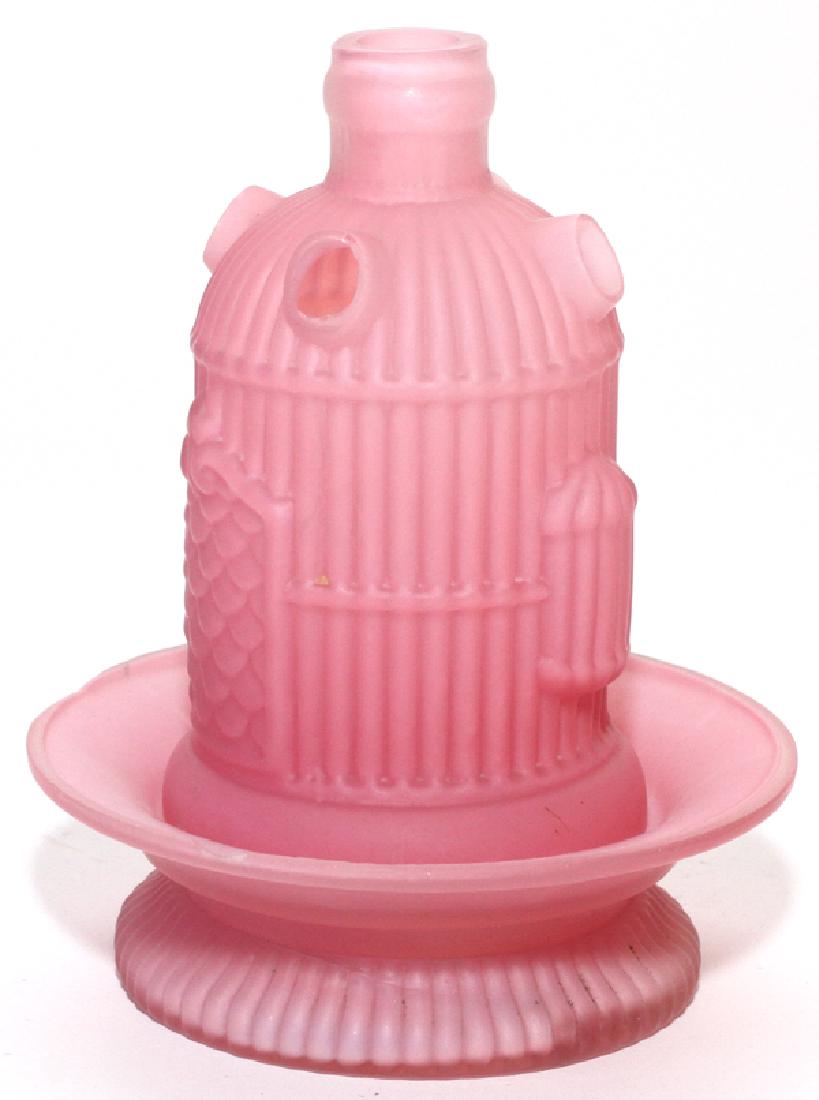 VICTORIAN SATIN GLASS FAIRY LAMP: VICTORIAN SATIN GLASS FAIRY LAMP, H 6.75", DIA 5.5":A pink satin glass birdcage-form shade with five vents at top and a matching base. From the Estate of Dr. Henry and Grace Stricker, Milford, Michiga