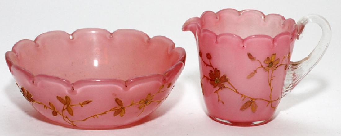 POSS. THOMAS WEBB ENAMELED GLASS CUP AND SAUCER: POSS. THOMAS WEBB ENAMELED GLASS CUP AND SAUCER, H 4 1/2":With handwritten label to underside reading "Webb / S & C". Having a raised gold floral design throughout, with a scalloped rim to both cup an