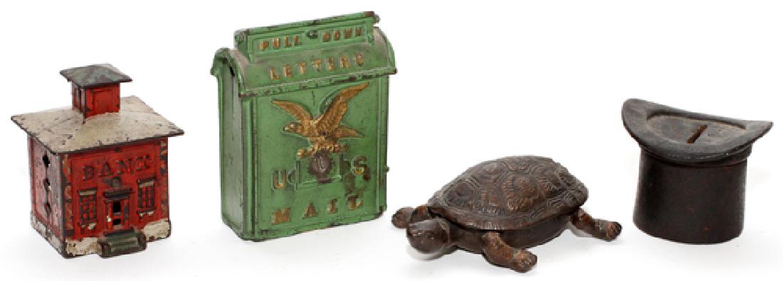 AMERICAN CAST IRON STILL BANKS 4 PCS. (1 of 2)