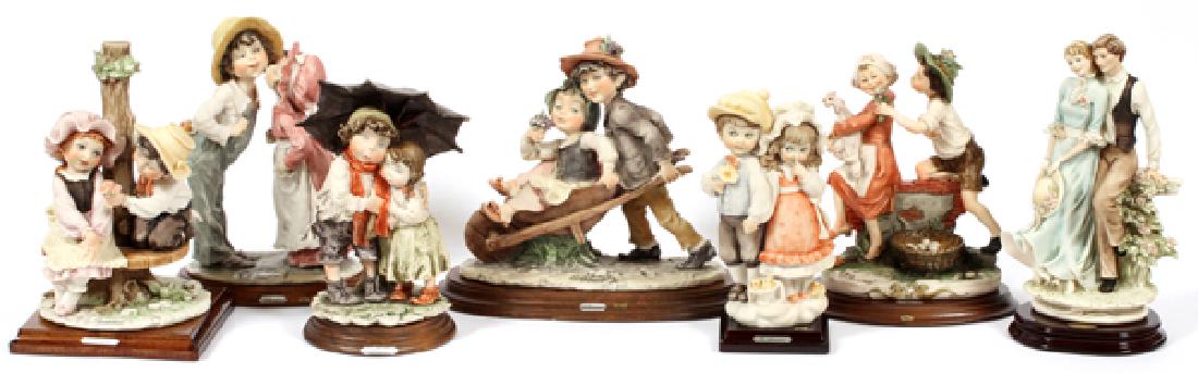 GIUSEPPE ARMANI CAPODIMONTE CHILDREN FIGURES: GIUSEPPE ARMANI, CAPODIMONTE CHILDREN FIGURES (6) ALSO "FLORENCE":Children figures at play. Lot of six. Also "Florence" figure of courting couple. Hand painted in Italy. Seven pieces in lot.