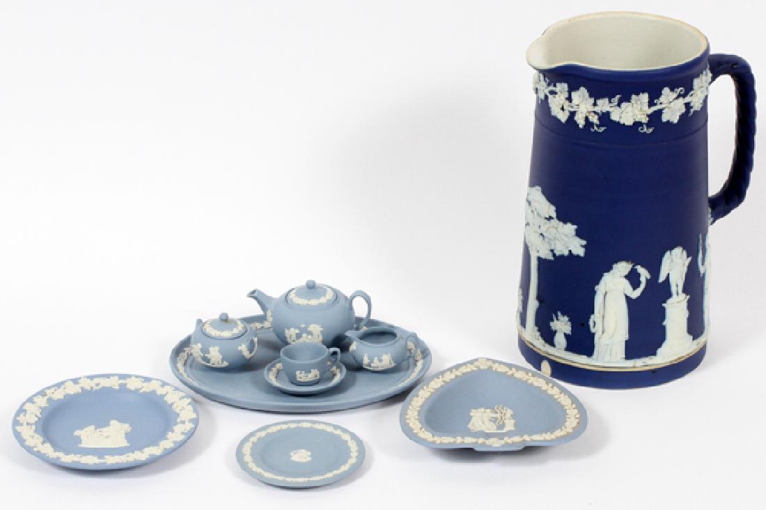 WEDGWOOD JASPERWARE ARTICLES 9 PCS.: WEDGWOOD JASPERWARE ARTICLES, 9 PCS., H TO 2 3/4", L TO 6 1/2", DIA 2"-4 3/8":Comprised of a miniature pale blue Jasperware tea set, including a teapot with lid, a waste bowl with lid, a creamer, a cu