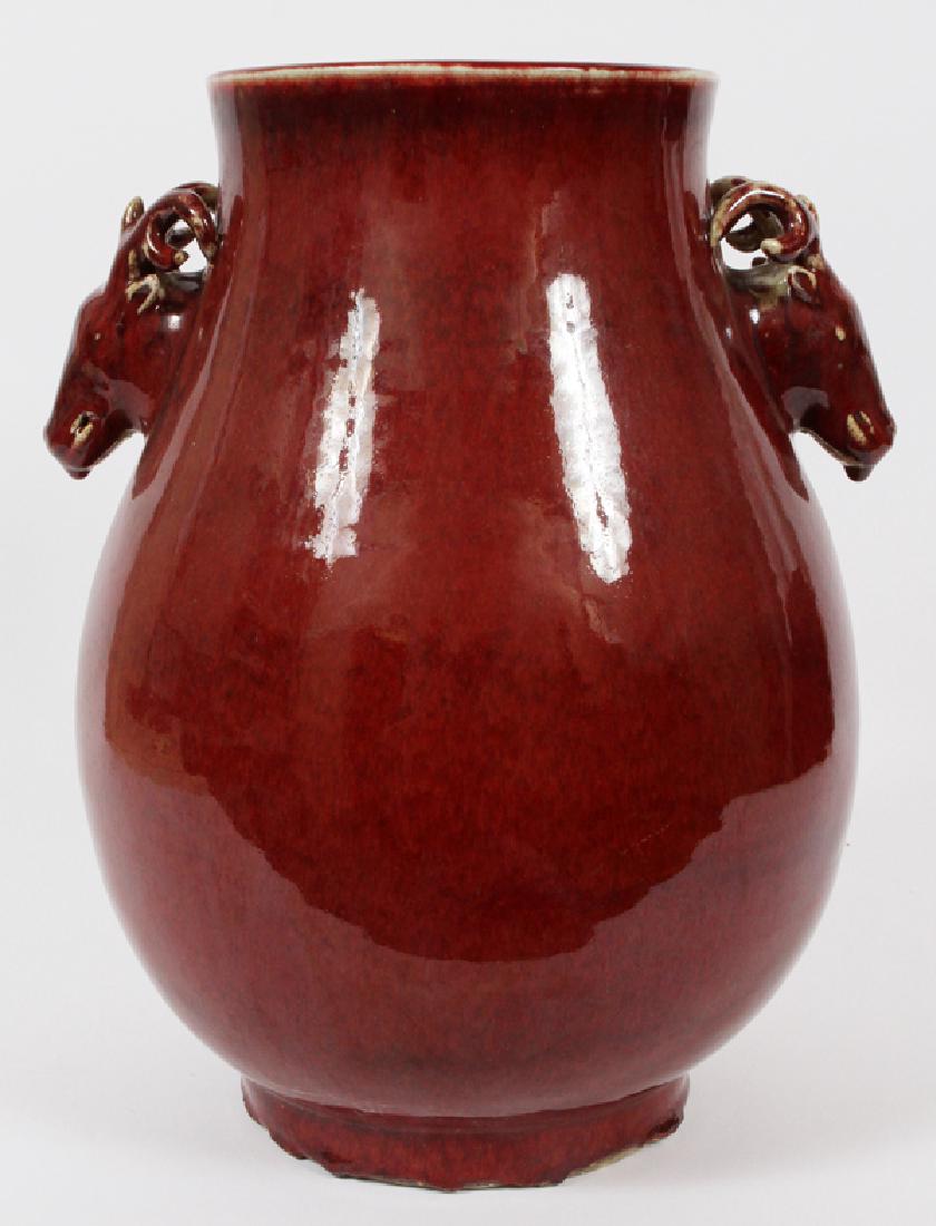 CHINESE OXBLOOD VASE: CHINESE, OXBLOOD VASE, H 15 1/2", DIA 12":Deer head handles.