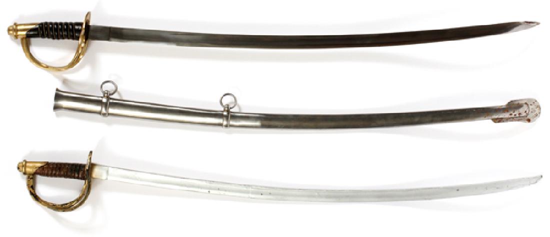 KEVIN COSTNER "DANCES WITH WOLVES" PROP SABRE: KEVIN COSTNER "DANCES WITH WOLVES" PROP SABRE, C. 1990:REPRODUCTION SWORDS DEPICTING 19TH CENTURY CAVALRY SWORDS WITH ONE SCABBARD.