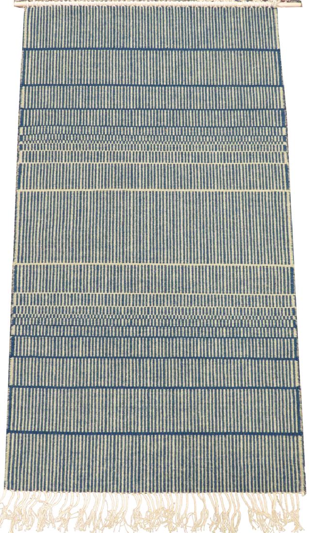 HEIJU OAK PACKARD WOOL WEAVING, W 2' 4", L 4' 2": HEIJU OAK PACKARD WOOL WEAVING, W 2' 4", L 4' 2"Hanging wool weaving by the artist Heiju Oak Packard. In designs of blue and cream. Wooden dowel at the top for hanging and a label on the reverse beari