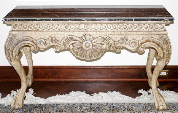 ITALIAN ANTIQUED CONSOLE TABLE, MARBLE TOP: ITALIAN, ANTIQUE FINISHED CONSOLE TABLE, MARBLE TOP, MODERN, H 30 1/2", L 50 1/2", D 19 1/2":Having a black marble top with white veining, ivory faux antiqued finish, shell and scroll carved apron, ca