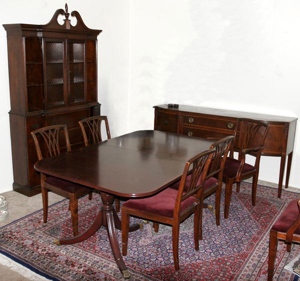 ROBERT IRWIN MAHOGANY DINING SUITE, C.1940: ROBERT IRWIN MAHOGANY DINING SUITE, C 1940, ELEVEN PIECES PLUS NON IRWIN BREAKFRONT:Breakfront is not Robert Irwin. Set includes 1 double-pedestal dining table, H.28 1/2", L. 66" x W. 44" with three l
