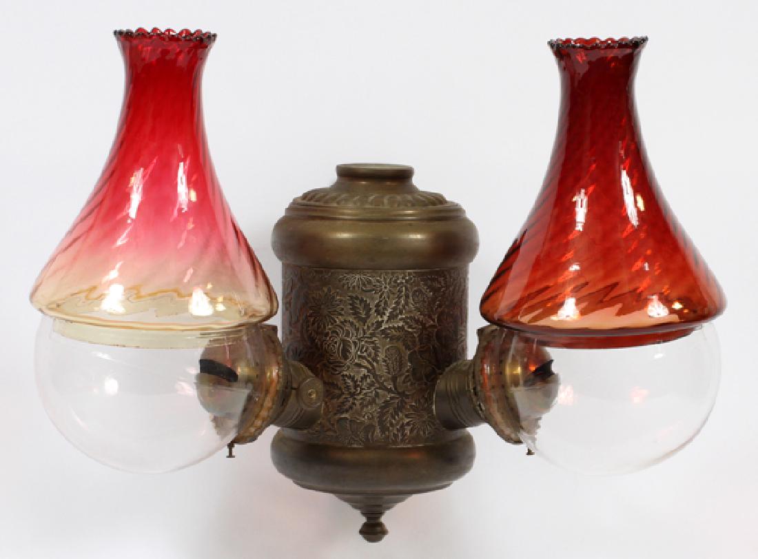 VICTORIAN METAL & GLASS OIL LAMP SCONCE: VICTORIAN METAL & GLASS OIL LAMP SCONCE, H 12", L 20", D 12"APPEARS TO STILL BE OIL, NOT CONVERTED. TWO SHADES WITH CLEAR BASINS AND A METAL HOUSING. FROM THE ESTATE OF DR. HENRY AND GRACE STRICKER, M