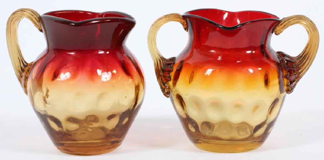 MINIATURE AMBERINA GLASS PITCHERS, C. 1870, 2 PCS. (1 of 2)