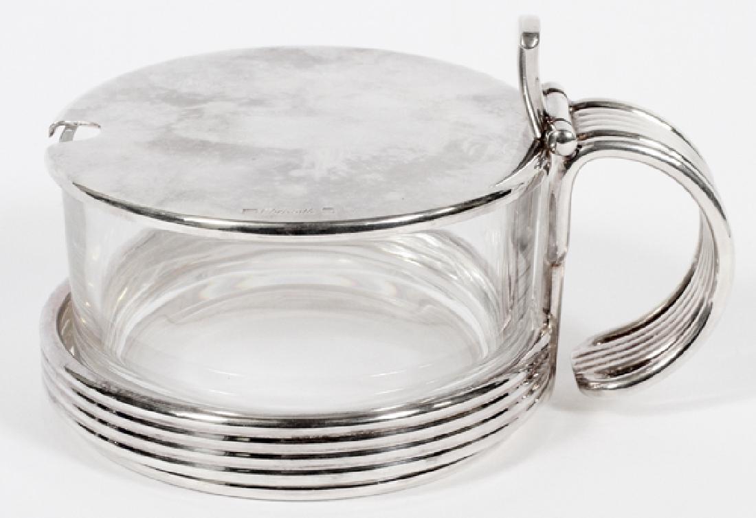 CHRISTOFLE 'VIBRATIONS' CHEESE/JAM DISH: CHRISTOFLE 'VIBRATIONS' CHEESE/JAM DISH, H 3 1/8", W 5":A Christofle confiturier in the Vibrations pattern, having a glass body that separates from its silver plate setting. Includes box.