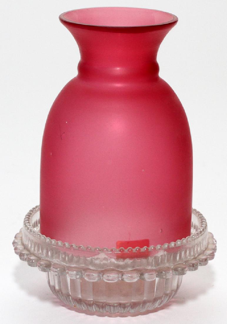 VICTORIAN PINK SATIN GLASS FAIRY LAMP: VICTORIAN PINK SATIN GLASS FAIRY LAMP, H 6", DIA 4"A PINK SATIN GLASS SHADE WITH A RUFFLED BOTTOM EDGE AND URN FORM TOP. WITH A CLEAR CLARKE'S PYRAMID BASE. FROM THE ESTATE OF DR. HENRY AND GRACE STRI
