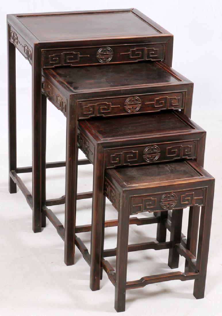 CHINESE TEAKWOOD NEST OF TABLES, C. 1900: CHINESE TEAKWOOD NEST OF TABLES, C. 1900, 4, H 27", L 19 1/4", D 14" HAND CARVED.